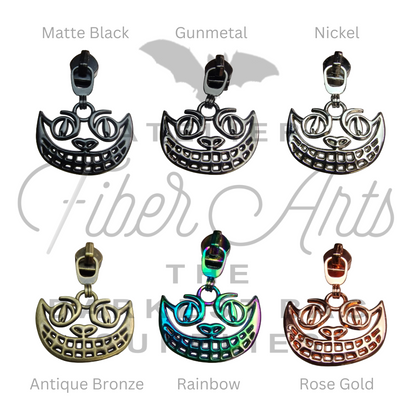 #5 Cheshire Grin Nylon Zipper Pulls in Various Finishes - 3pcs at Atelier Fiber Arts