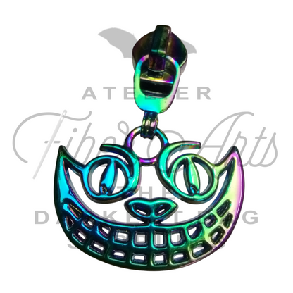 #5 Cheshire Grin Nylon Zipper Pulls in Various Finishes - 3pcs at Atelier Fiber Arts